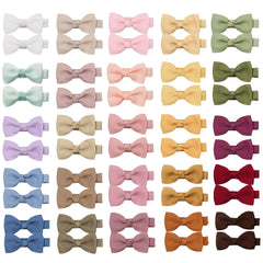 CELLOT tiny bow clip close-up with velvet inner grip for stability.