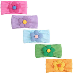 CÉLLOT green headband with flower adds cute detail to outfits.