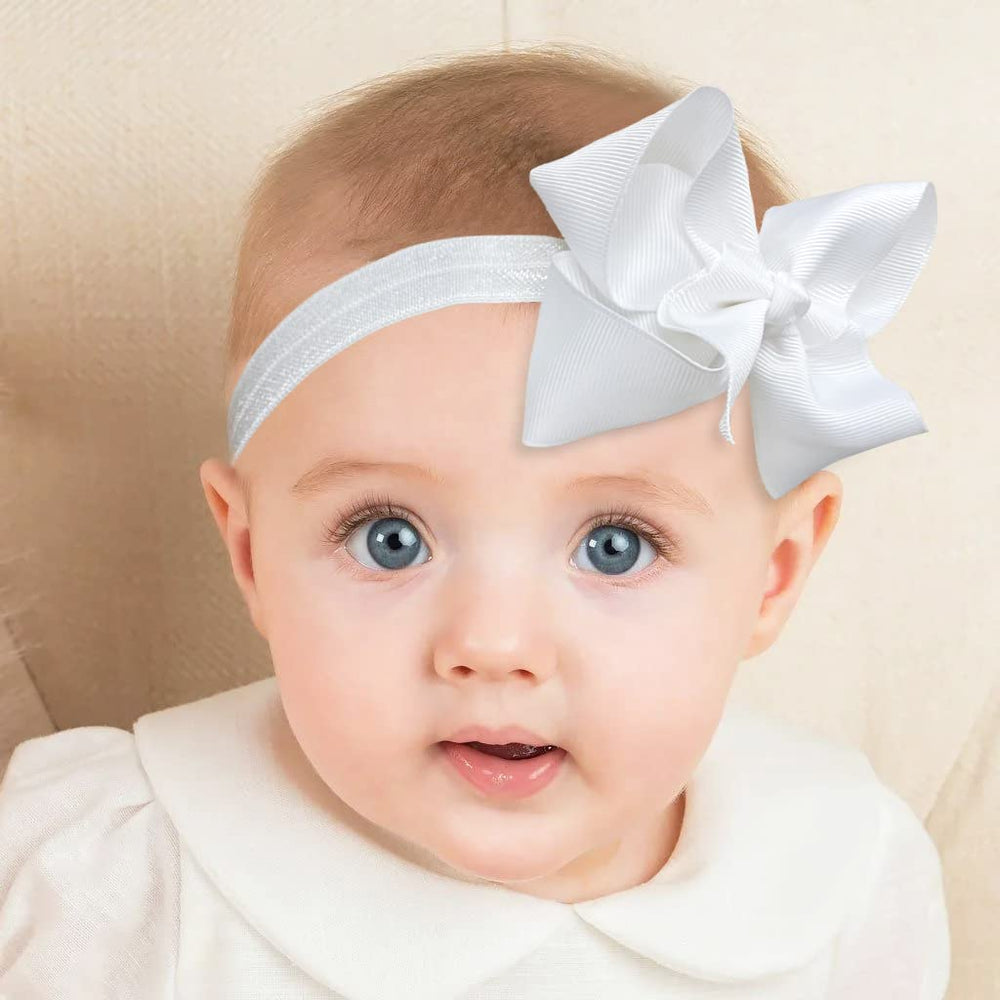 CÉLLOT orange grosgrain bow headband for lively weekend wear