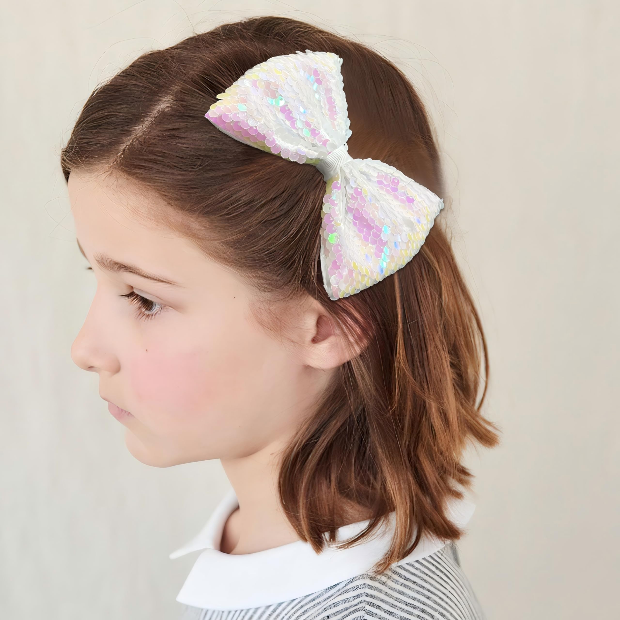 CÉLLOT premium sequin fabric bow resists fading and stays secure.