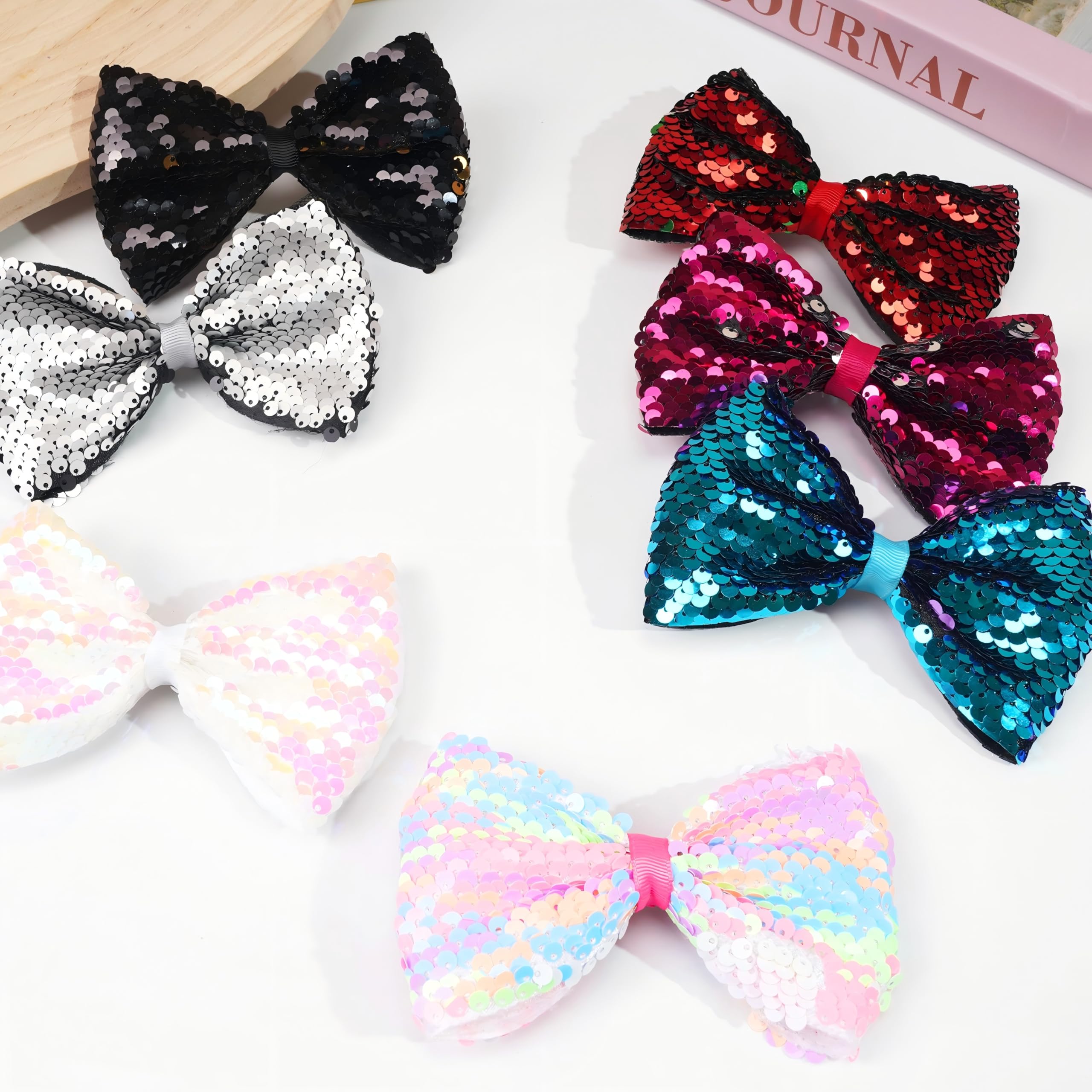 CÉLLOT party bow accessory for ponytails, buns, and half-up styles.