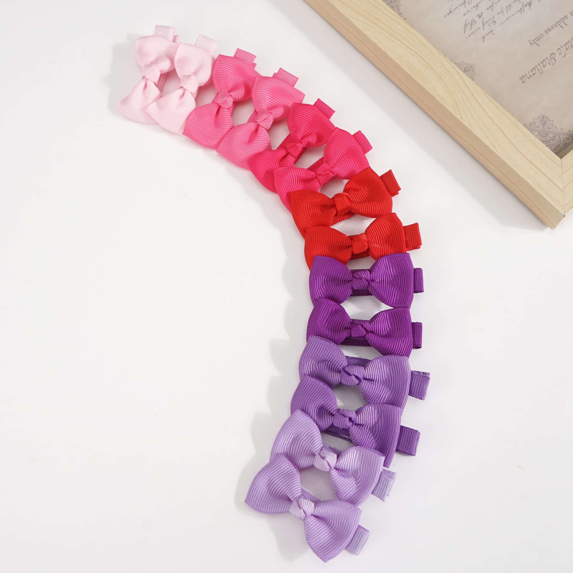 CELLOT velvet inner-clip detail helps secure tiny bows safely.