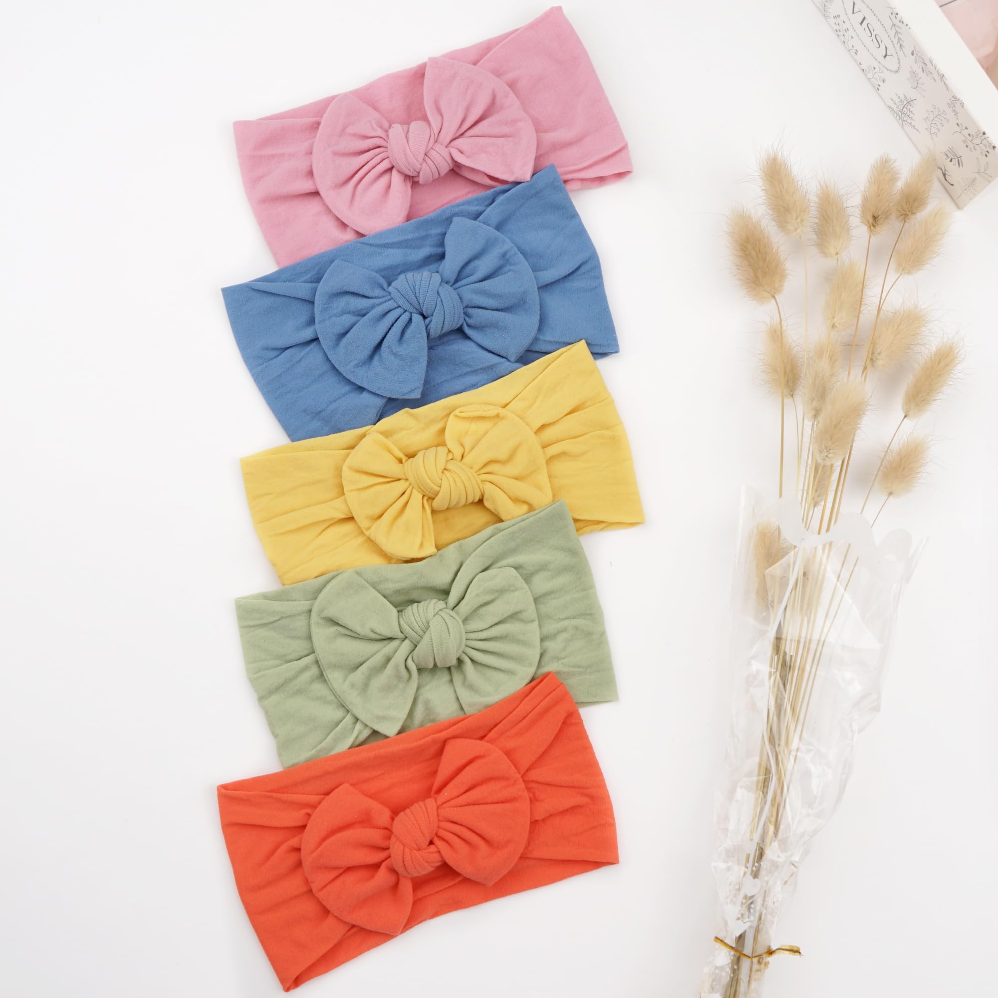 CÉLLOT knot headbands stay secure without pinching delicate hair.