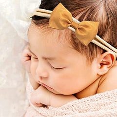 CÉLLOT stretchy nylon headband fits newborns to toddlers