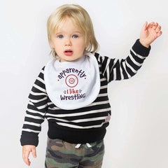 ChalkTalkSPORTS wrestling baby bib shows Velcro closure for secure stay during meals.