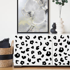 CharmFlo vinyl leopard decals for kids' rooms, repositionable and residue-free.