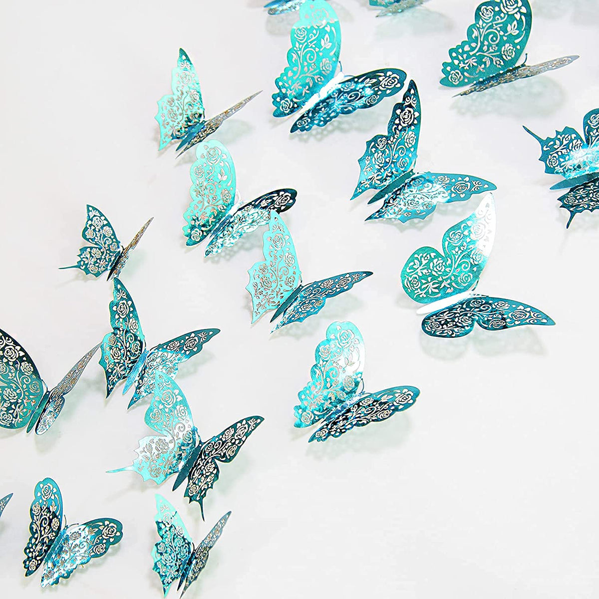 Cheerland butterflies on wall for vibrant teal décor.