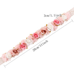 Cherrboll baby headband close-up shows delicate flower detail for photos.