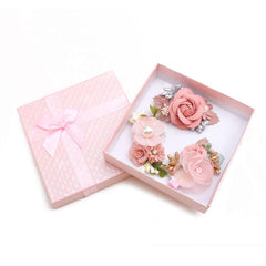 Cherrboll cream flower clip with pearls offers soft hold