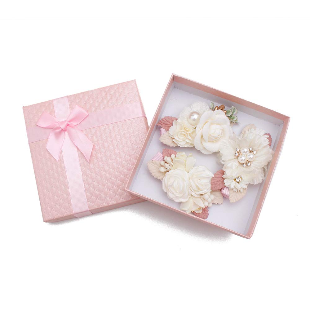 Cherrboll pastel-pink flower clips add soft color to toddler outfits