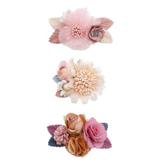 Cherrboll pink flower hair clip adds a delicate touch to baby outfits.
