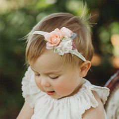 Cherrboll yellow flower headband adds cheerful color with comfort.