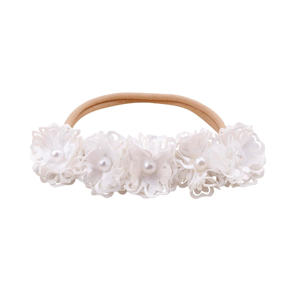 cherrboll headband elastic stretch demonstrates growth from newborn to toddler.