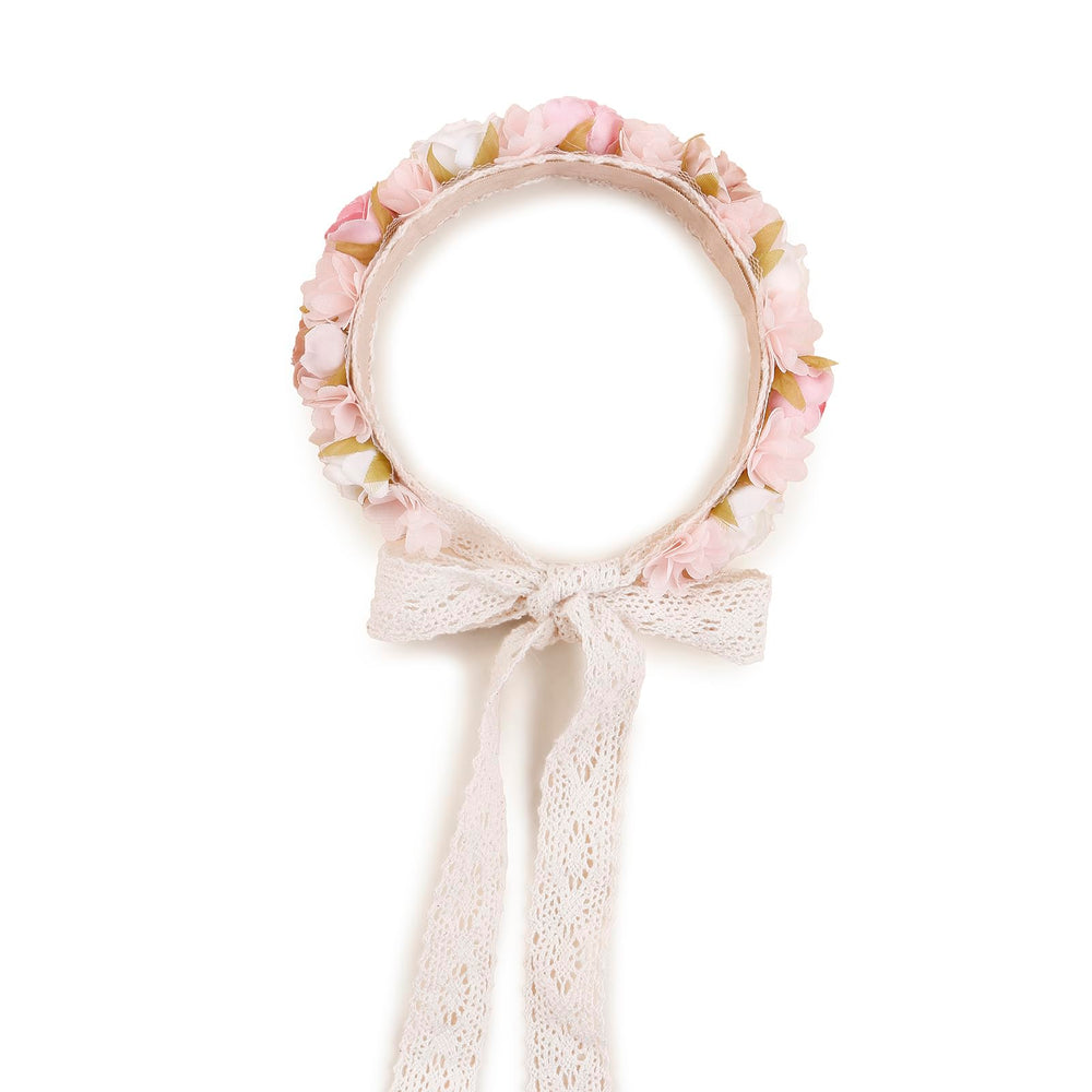 Cherrboll kids headband worn with an elegant floral look for outfits.