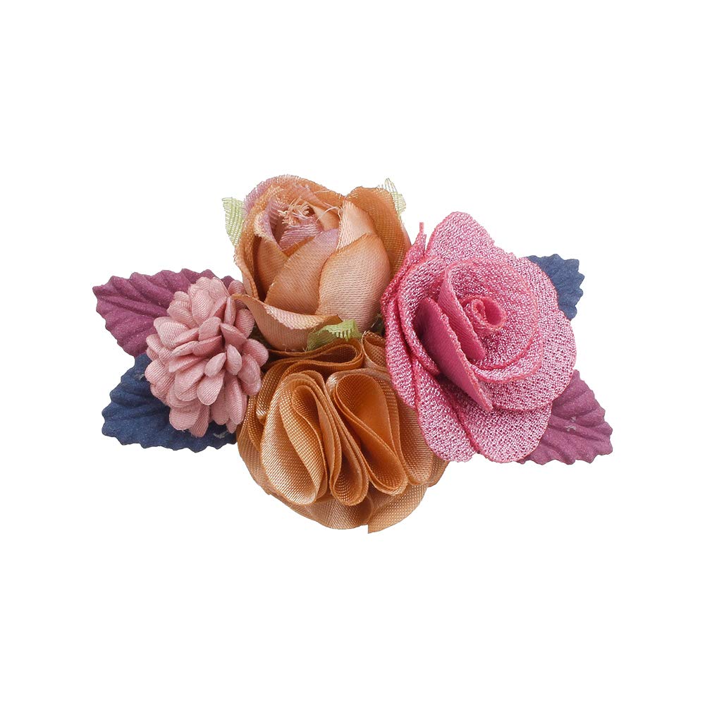Cherrboll newborn photo setup featuring a flower hair clip in action.