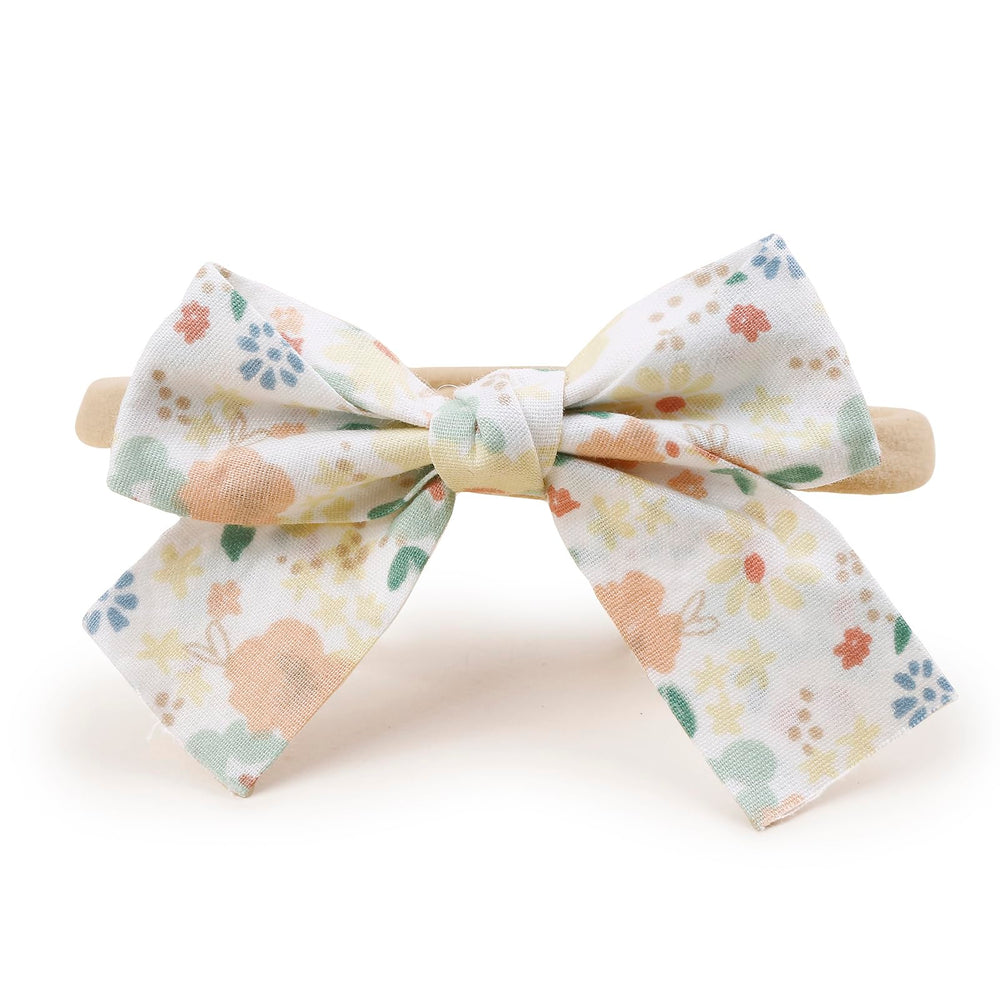 Cherrboll newborn photography prop with flower accents for sweet sessions.