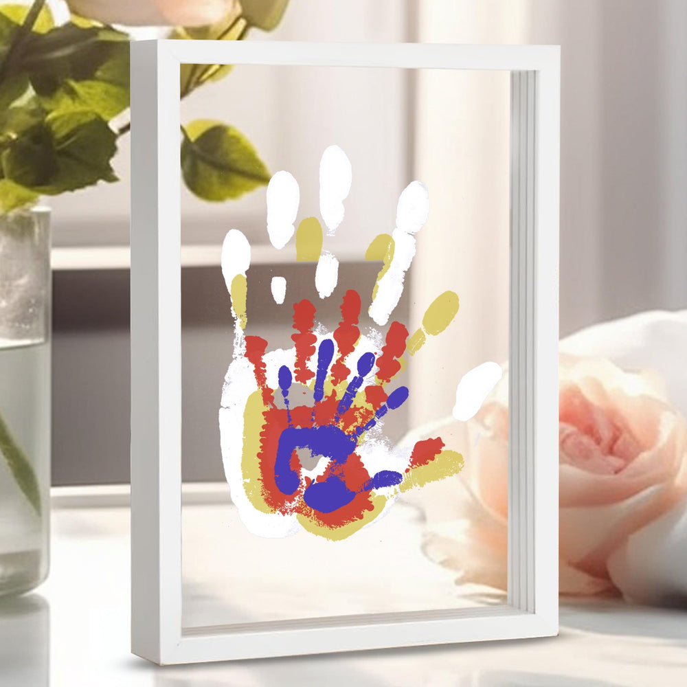 CHERRY CHEERS family handprint kit frame setup shows a display-ready keepsake