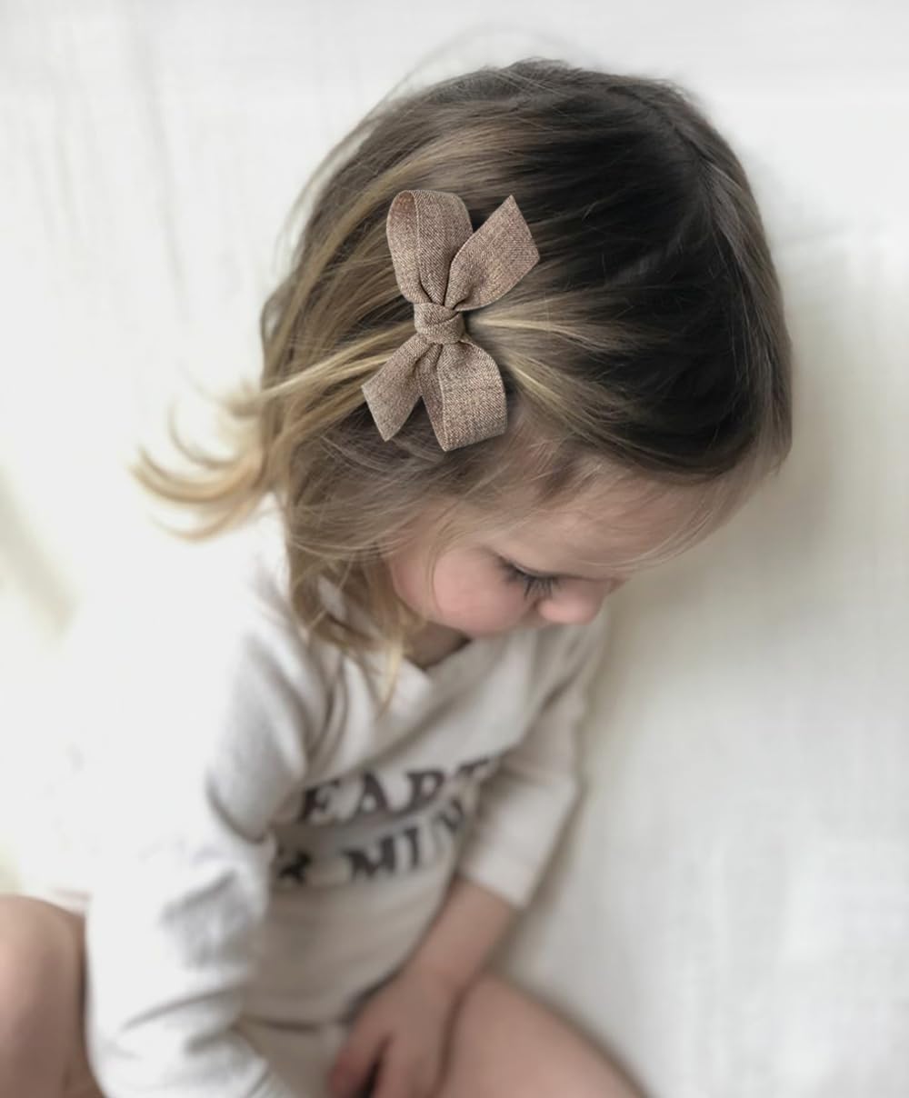 Cherssy natural colors bows clip adds subtle style to everyday outfits.