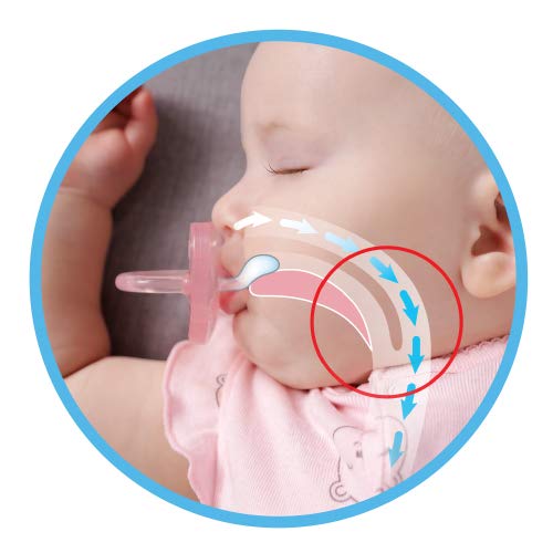 Chicco PhysioForma baby smiling while using the day pacifier