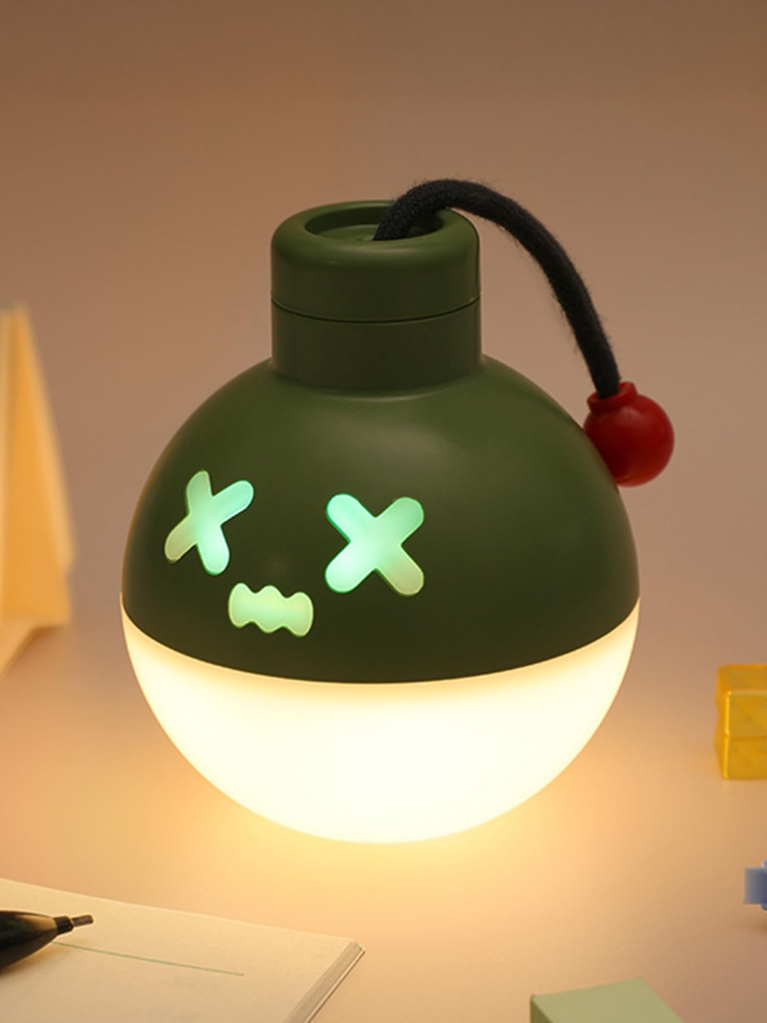 ChicLumen pull-string bomb night light front view with calming RGB glow for kids room.