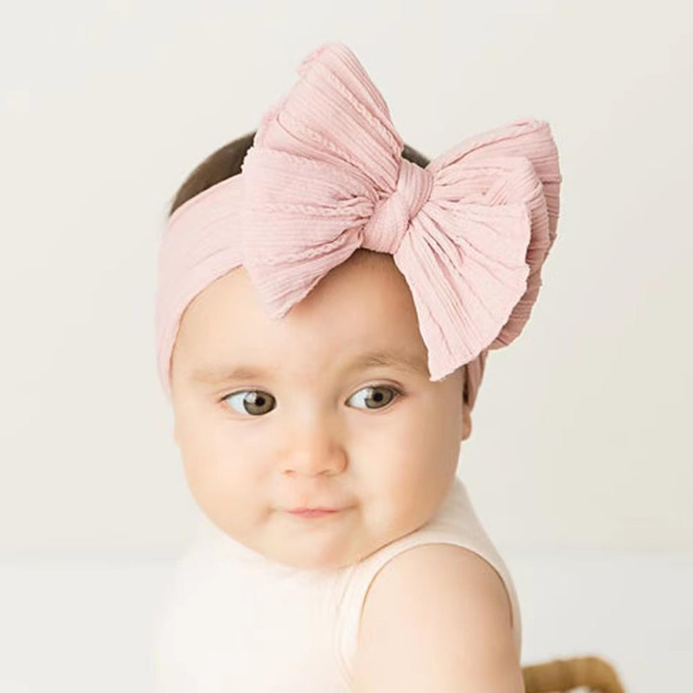 Chiduerm baby bows headband taupe complements outfits and keeps baby comfortable all day.