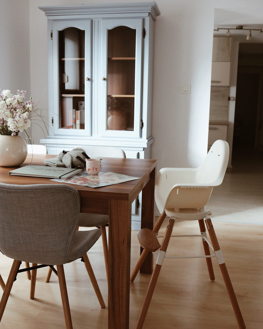 Childhome Evolu One multiple heights suit growing children at various tables.