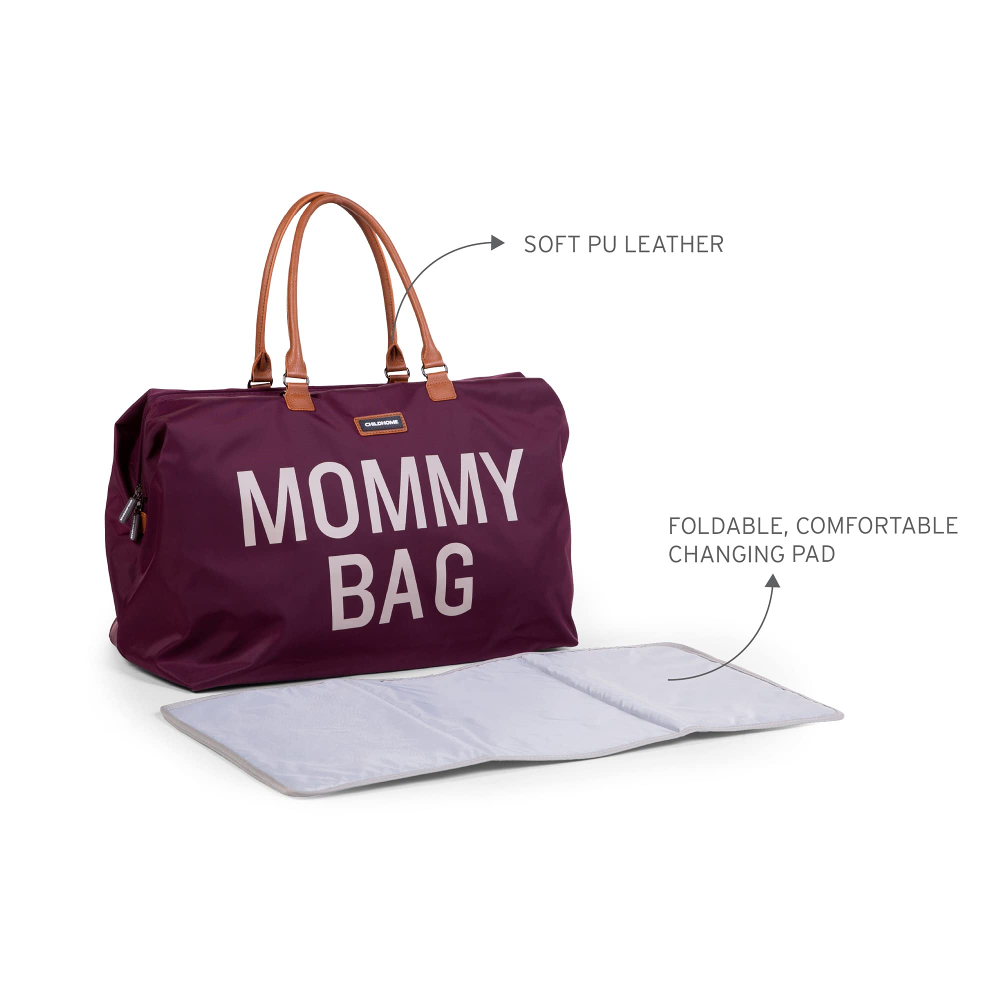 Childhome Mommy Bag with removable strap offers comfortable hands-free carry.