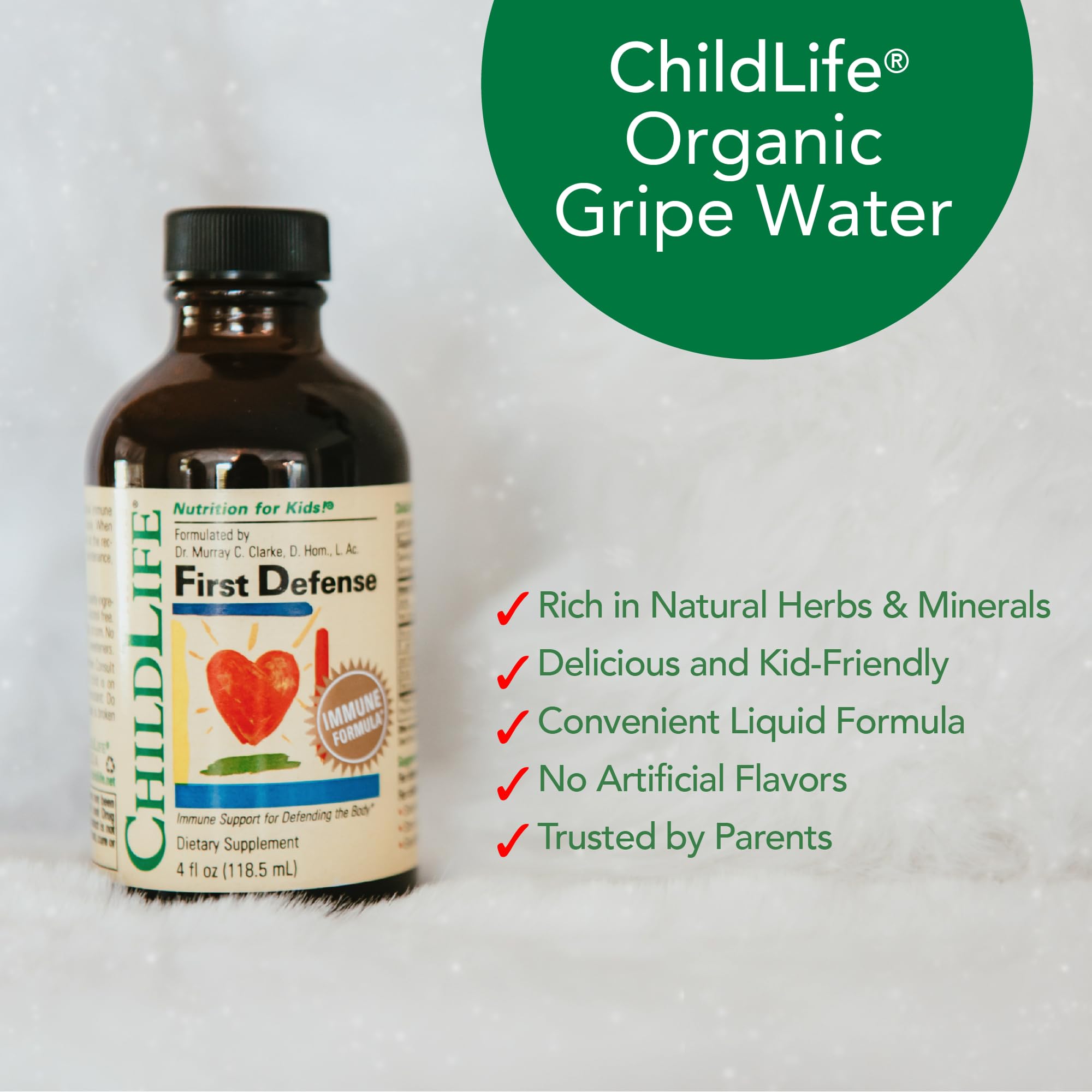 CHILDLIFE ESSENTIALS First Defense bottle shown with a smiling child in the background