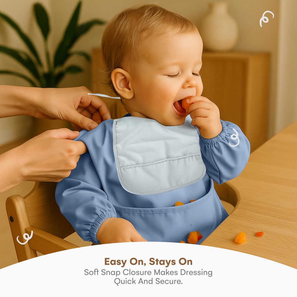 CHILDLIKE BEHAVIOR art-friendly bib protects clothing during messy play.
