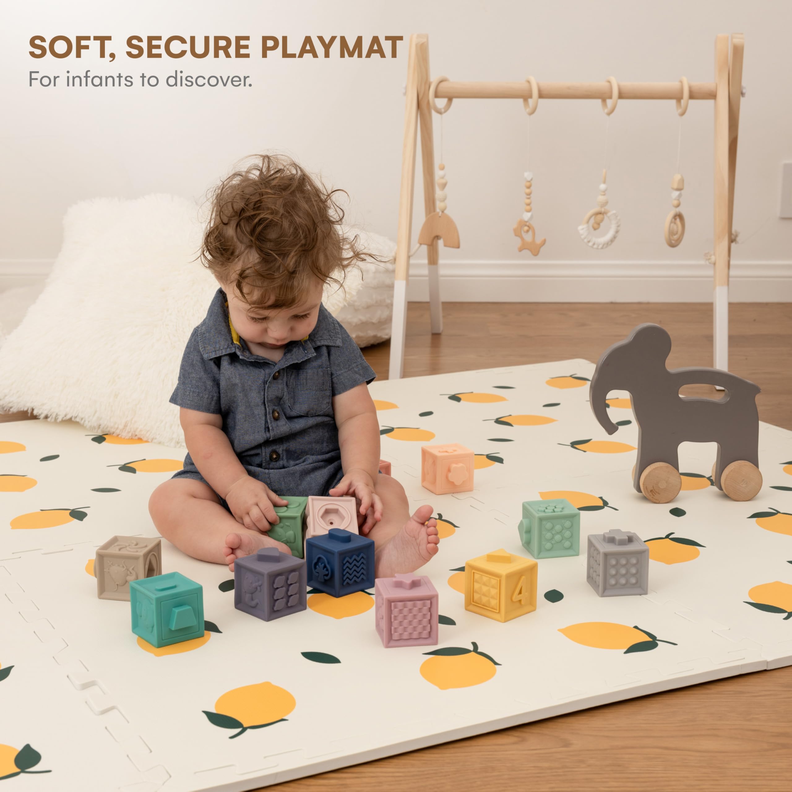 CHILDLIKE BEHAVIOR XL baby play area on a soft, cushioned surface for infants