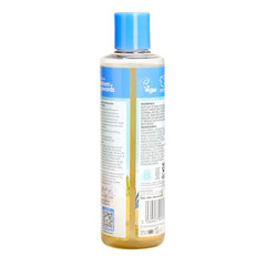 Childs Farm Coco-Nourish Shampoo lather closeup emphasizing mild formula for defined curls