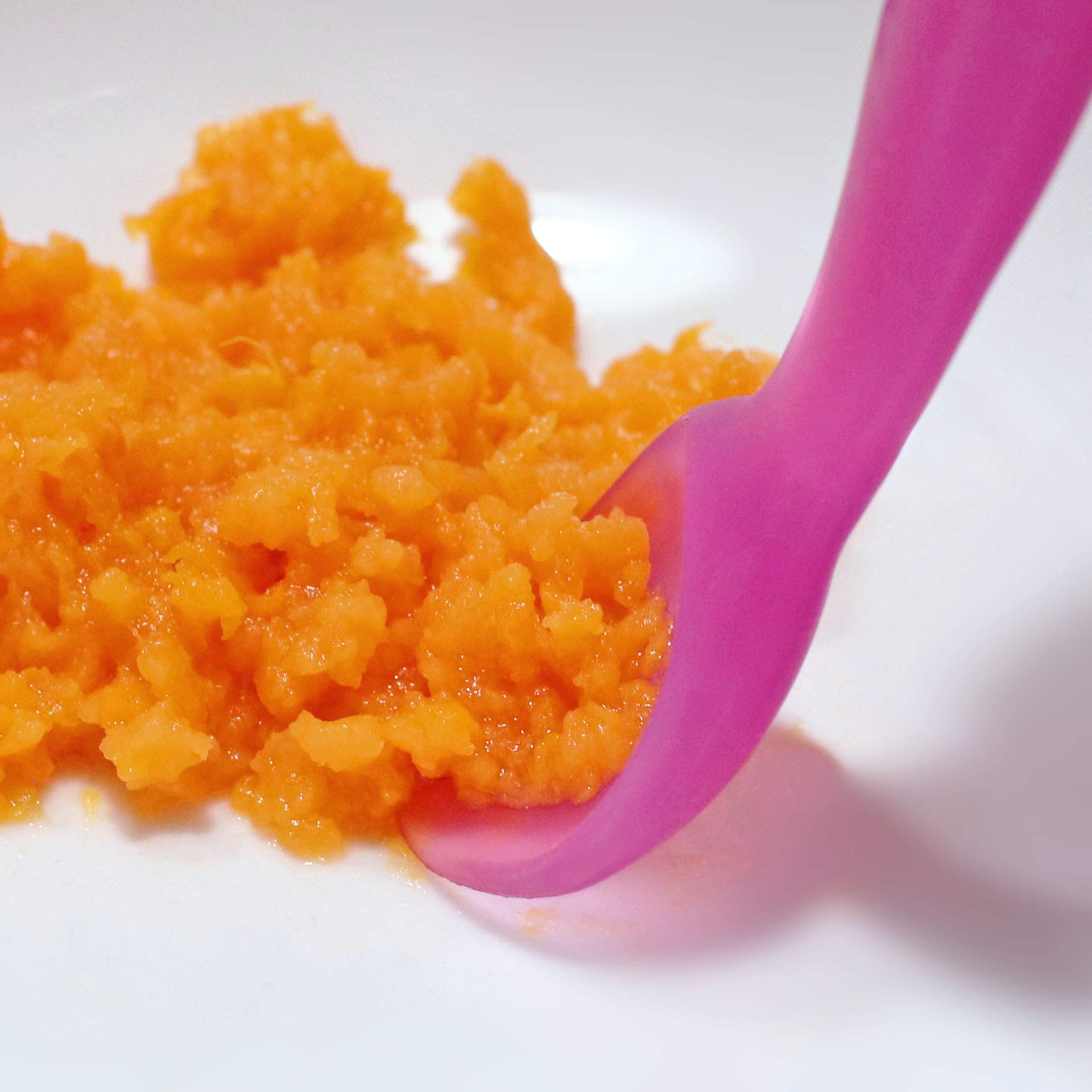 ChooMee silicone spoon with firm handle provides stable grip for tiny hands.