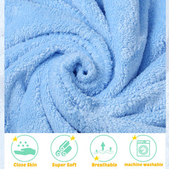 Baby wearing Chumia hooded towel, drying after bath.