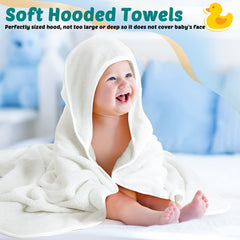 Chumia newborn wearing hooded towel cozy post-bath warmth