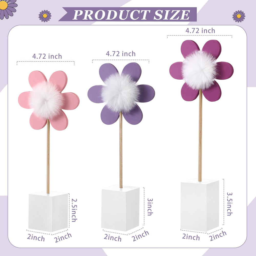 Chunful fluffy pom pom centers add playful detail to a daisy table centerpiece