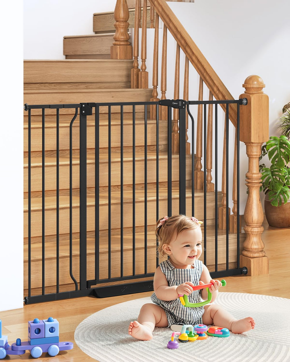 Cideny 34-inch extra-tall baby gate at stairs protects toddlers and pets.
