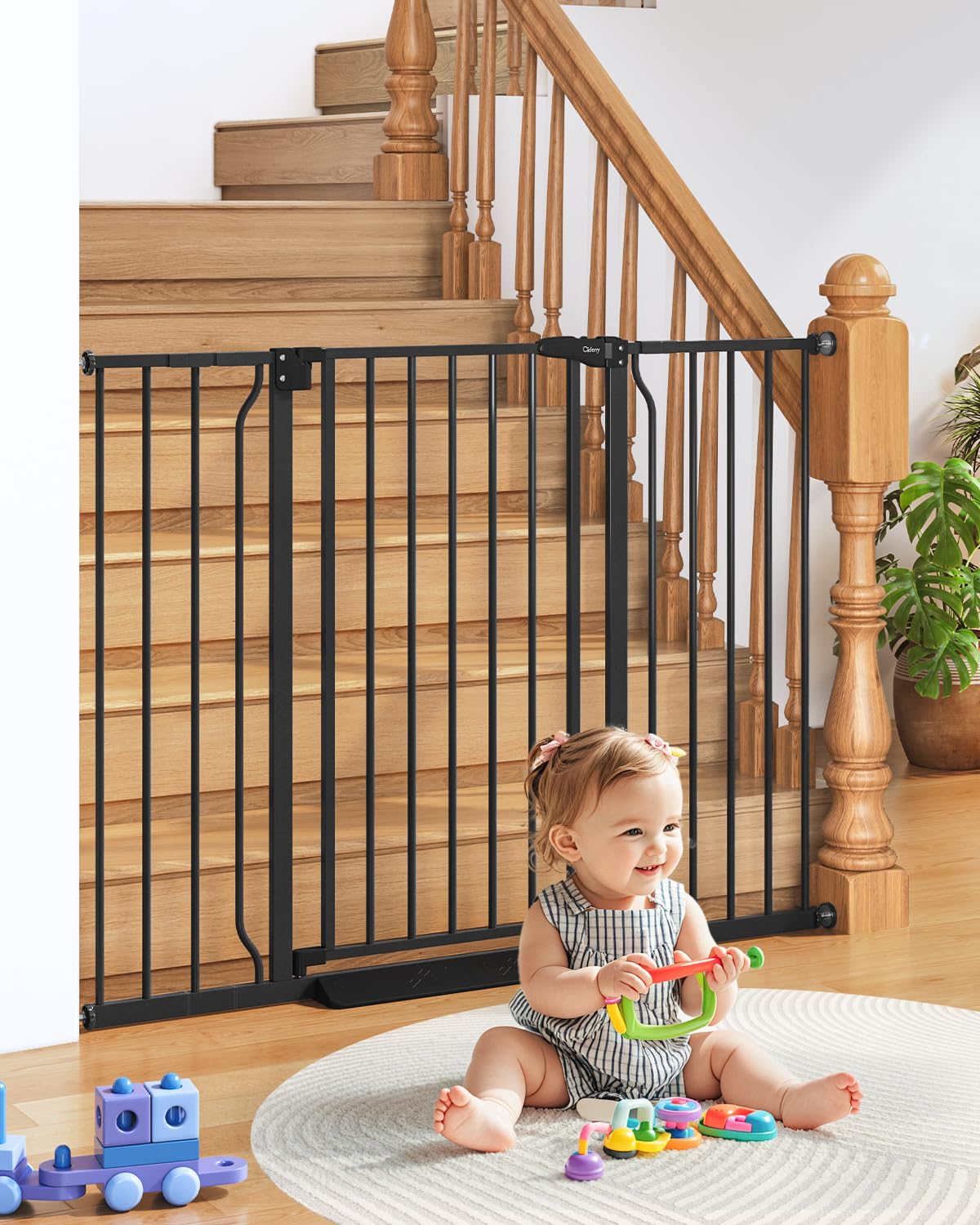 Cideny 34-inch extra-tall baby gate at stairs protects toddlers and pets.