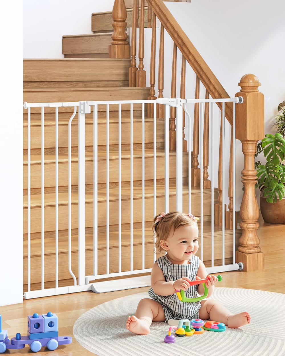 Cideny 34-inch extra-tall baby gate at stairs, securing access for children and pets.