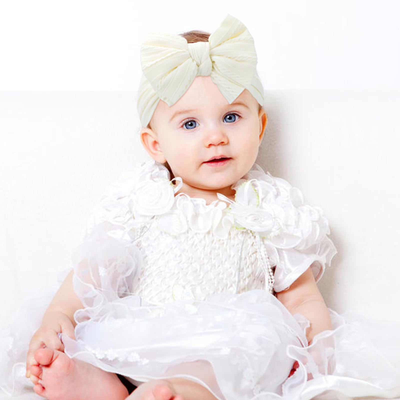 Cinaci purple headband with bold bow for special occasions