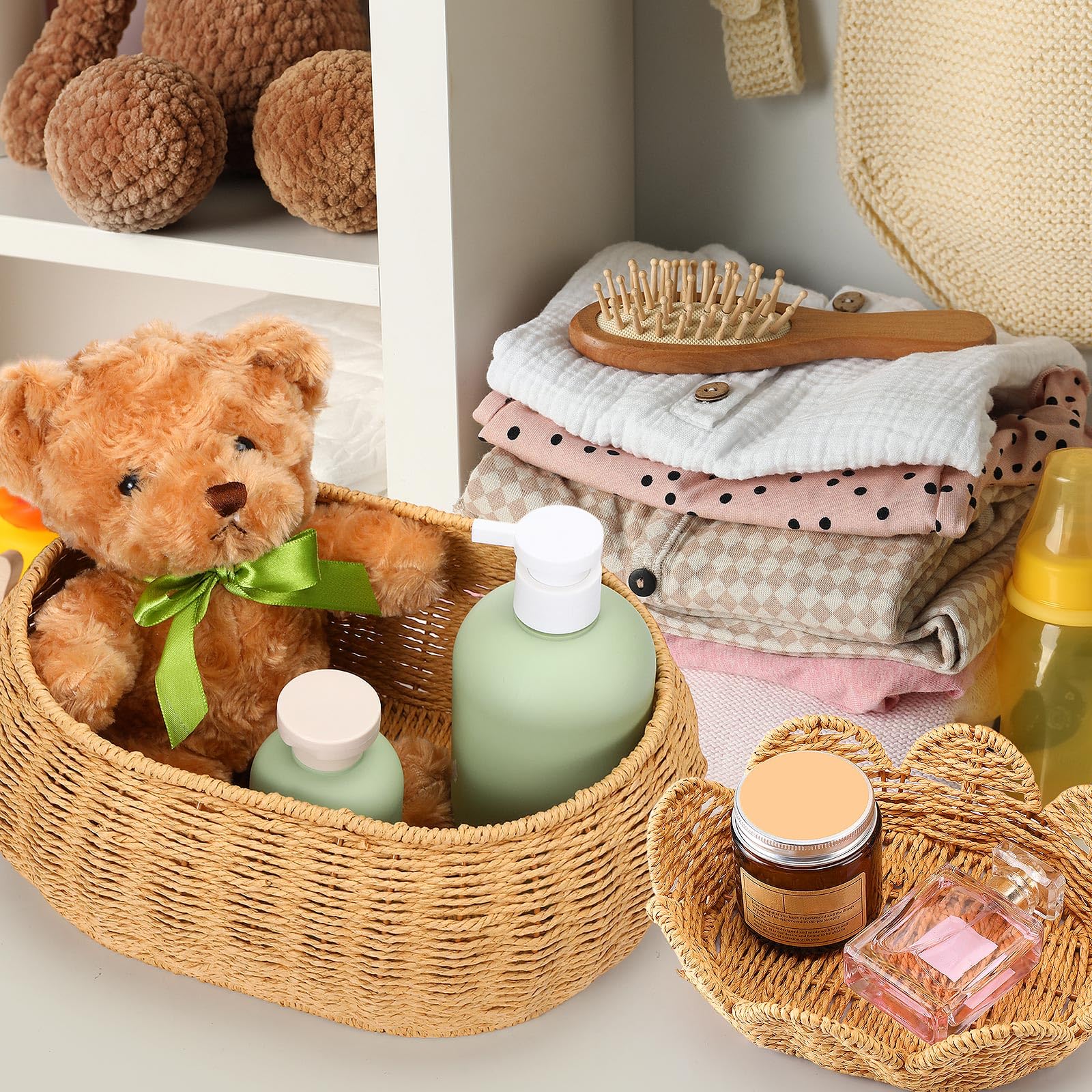 Cinnvoice scalloped basket with lid filled with baby essentials on a changing table