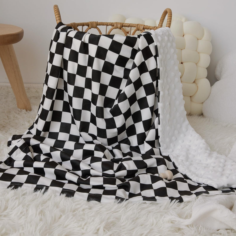 Civarua Kids checkered blanket double-layer backing highlights plush warmth for snuggling.