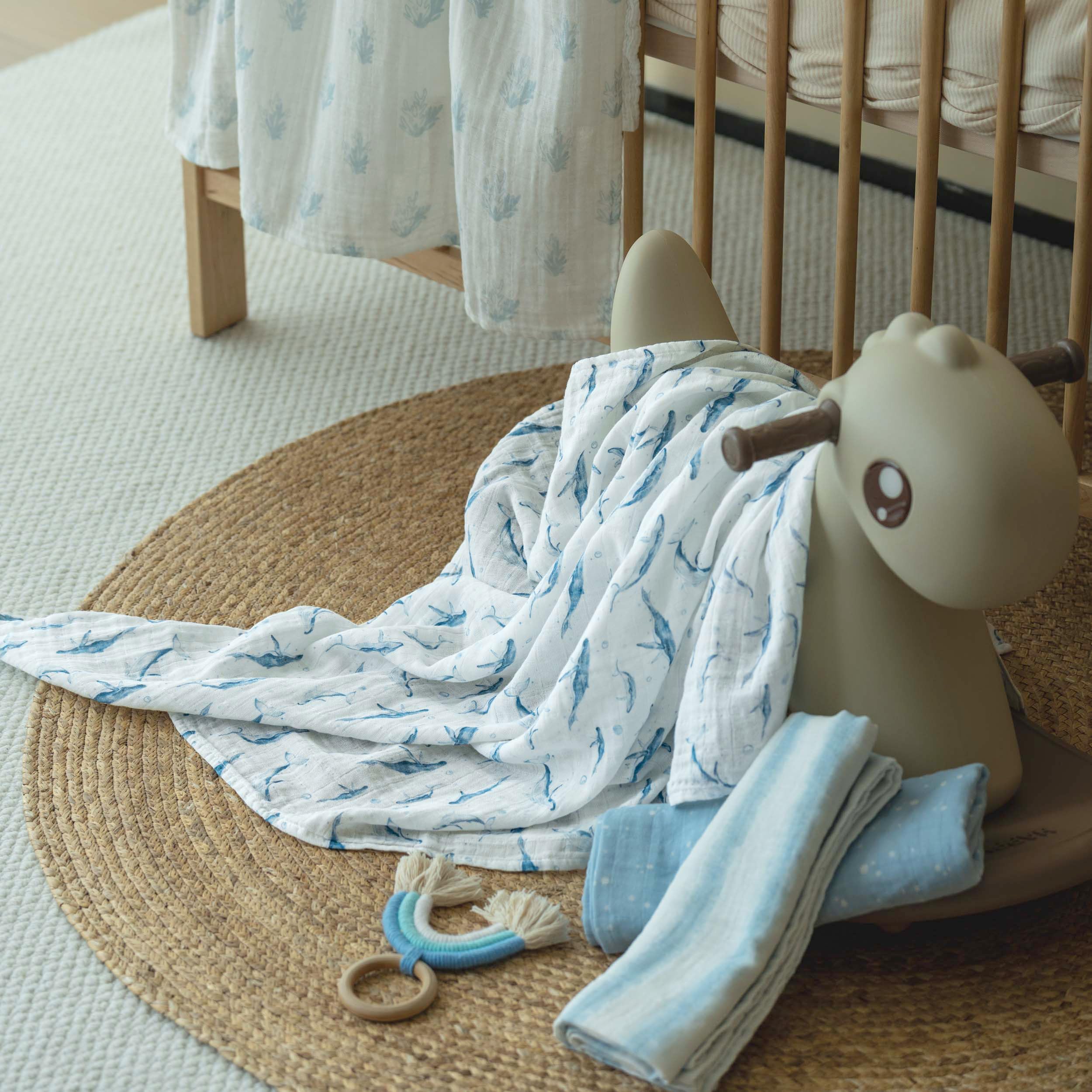 CIVARUA KIDS swaddle as changing table cover for quick cleanups.