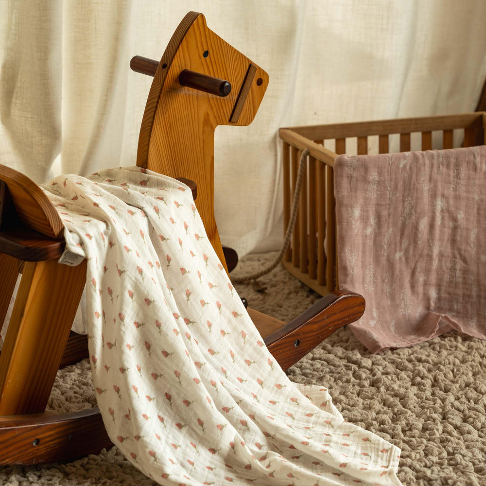 Civarua Kids muslin swaddle blankets used as nursing cover illustration, versatile baby care.
