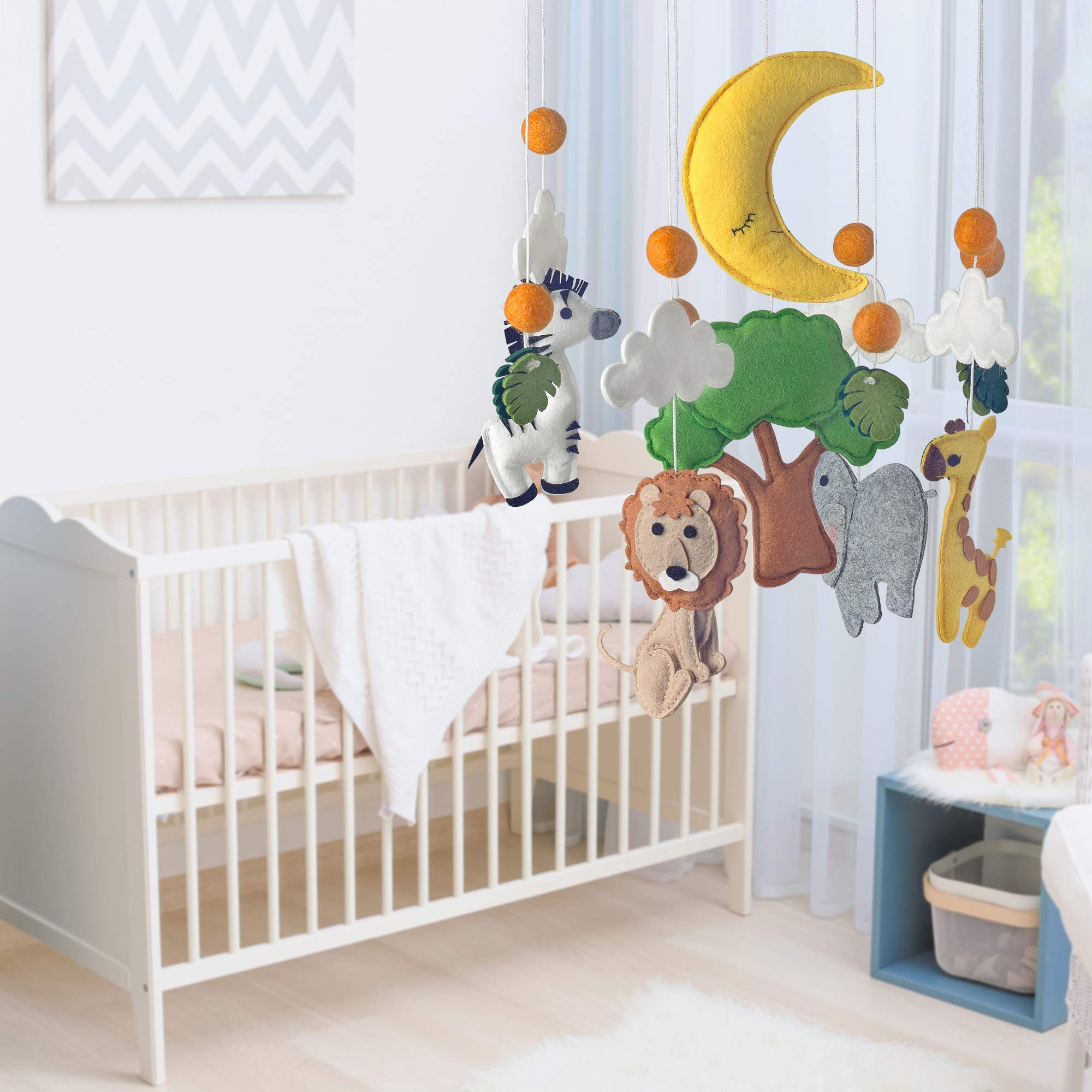Gift-ready baby shower option featuring a colorful nursery mobile by C&K WORKS.