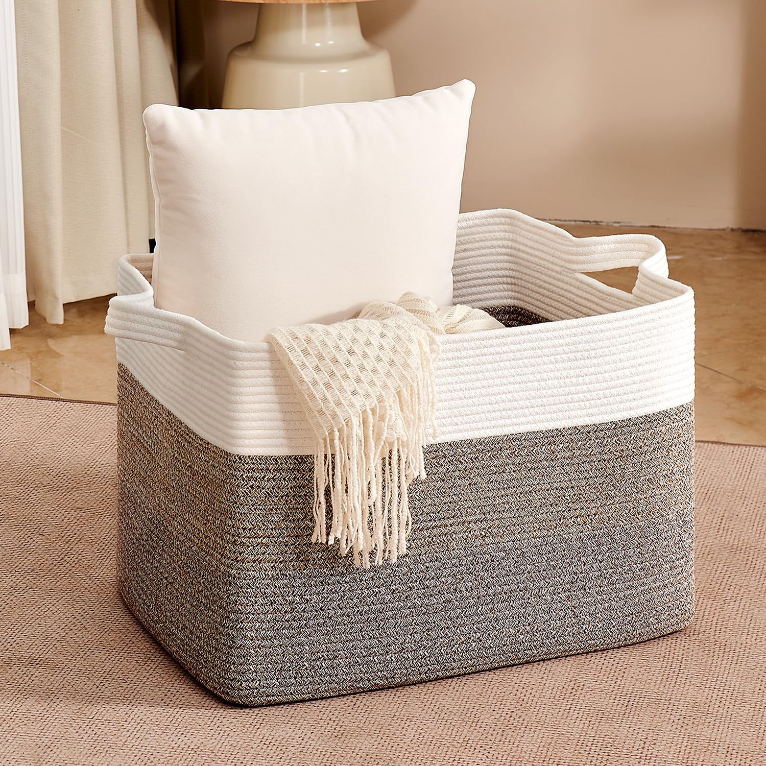 CLHMILY&Z handwoven basket with sturdy handles offers easy portability for room-to-room organization.