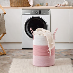 CLHMILY&Z oversized handles pink rope basket for easy carrying.