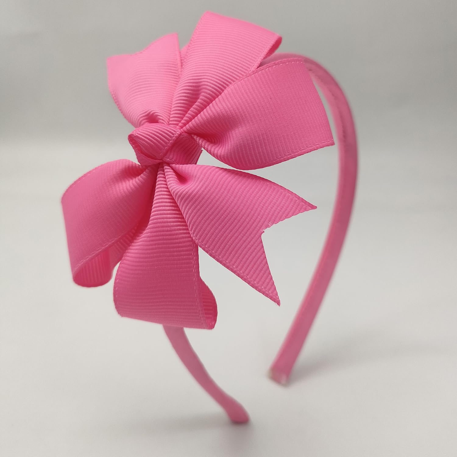 Clipband pink ponytail holders for quick, tidy hairstyles.