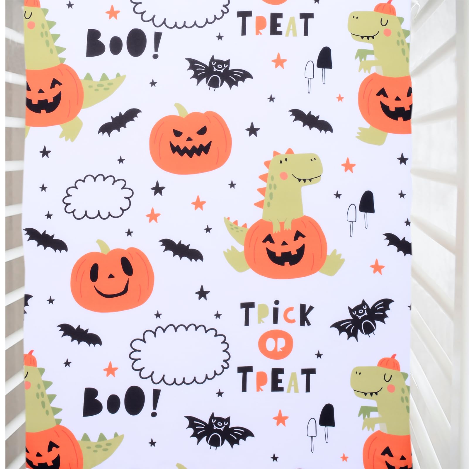 Cloele dinosaur crib sheet with pumpkin pattern for Halloween nursery decor