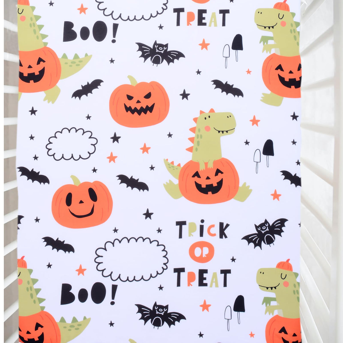 Cloele dinosaur crib sheet with pumpkin pattern for Halloween nursery decor