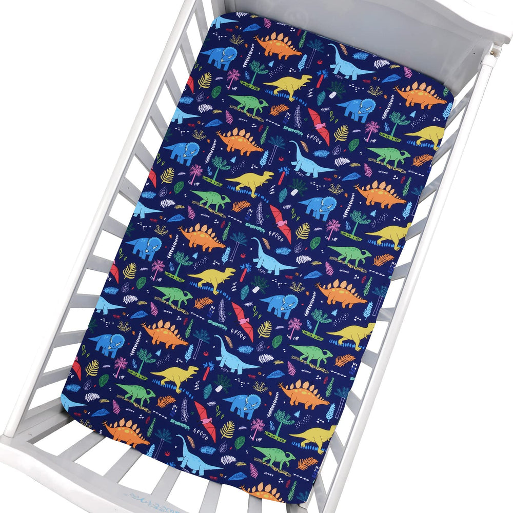 Cloele dinosaur fabric closeup shows soft, breathable polyester.